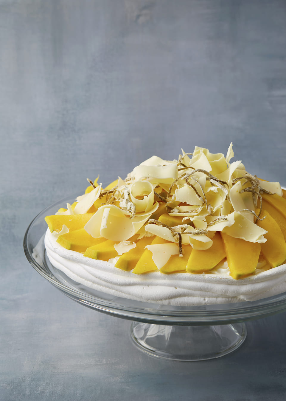 Mango Pavlova with candied lime rind & white chocolate